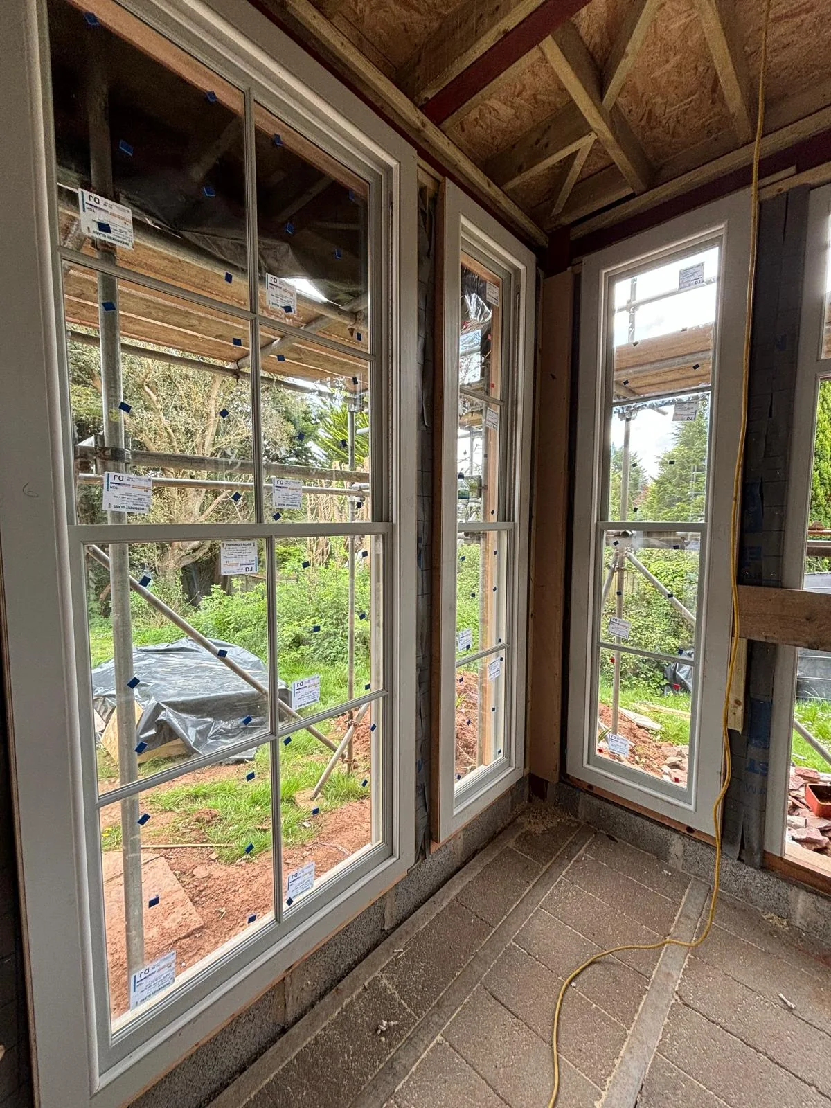 Wide interior view of new Accoya sash windows and glazing.
