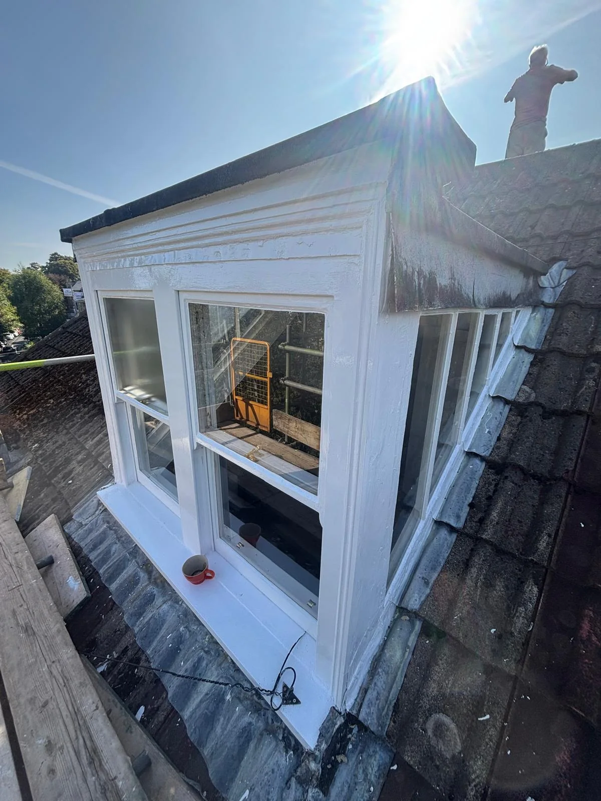 Refurbished sash windows in a Clifton dormer, viewed at an angle.