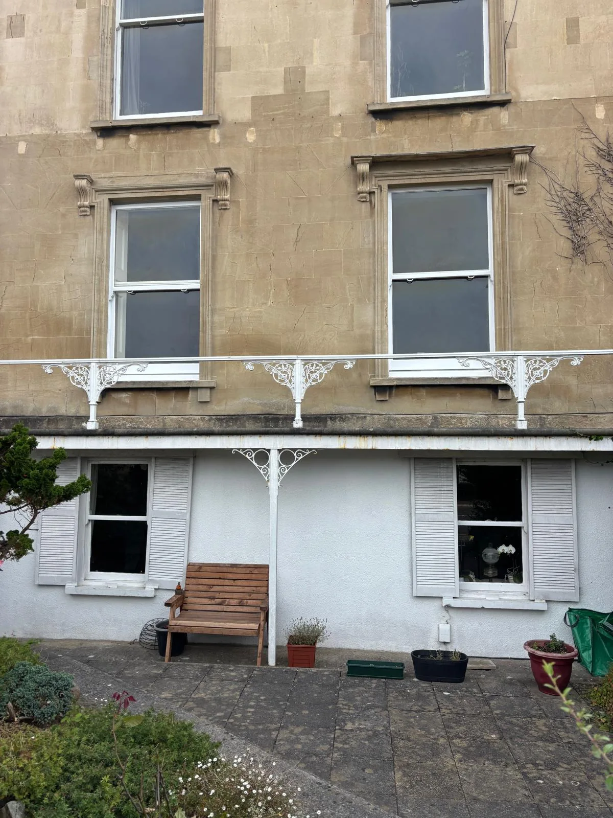 Rear elevation of a period property with sash windows.